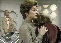 [The Doctor, Tegan and Nyssa, stunned by Adric's death.]