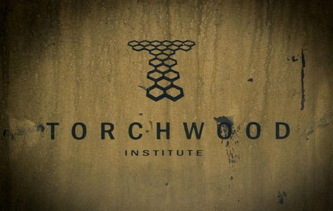 [The logo for the Torchwood Institute (founded 1879).]