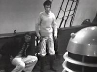 [The crew of the Mary Celeste confronted by a Dalek.]