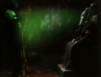 [The Doctor attacked by Sutekh.]