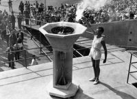 [The torch is lit at the 1948 Summer Olympics.]