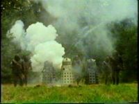 [The Daleks and Ogrons attack Auderly House.]