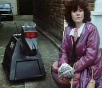 [Sarah Jane Smith (with K9) moments before being abducted to Gallifrey.]