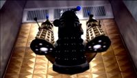 [The Cult of Skaro emerge from the Void ship.]